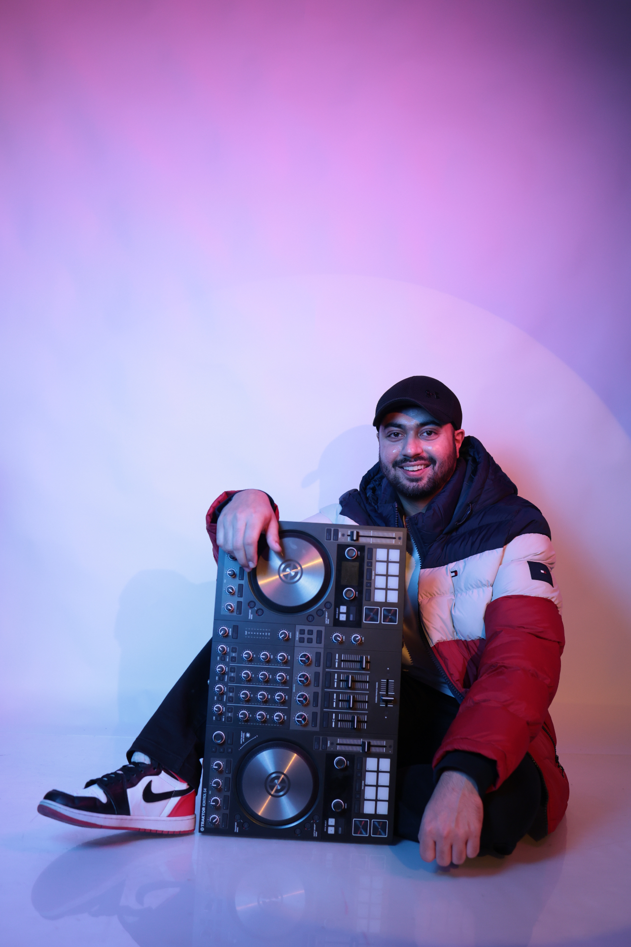 Sahib in the studio with his Traktor Kontrol S4 controller.