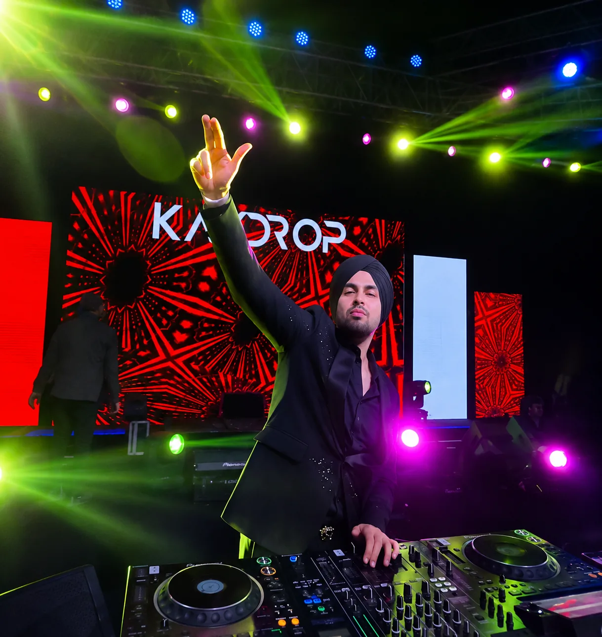 Kaydrop on stage with the KAYDROP LED backdrop and full festival lighting rig.